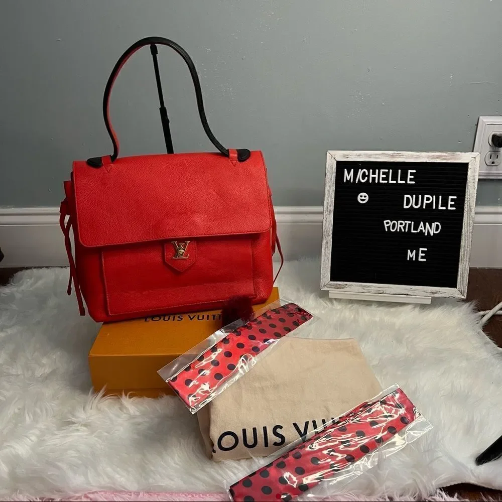 LOUIS vuitton calfskin lockme pm orient